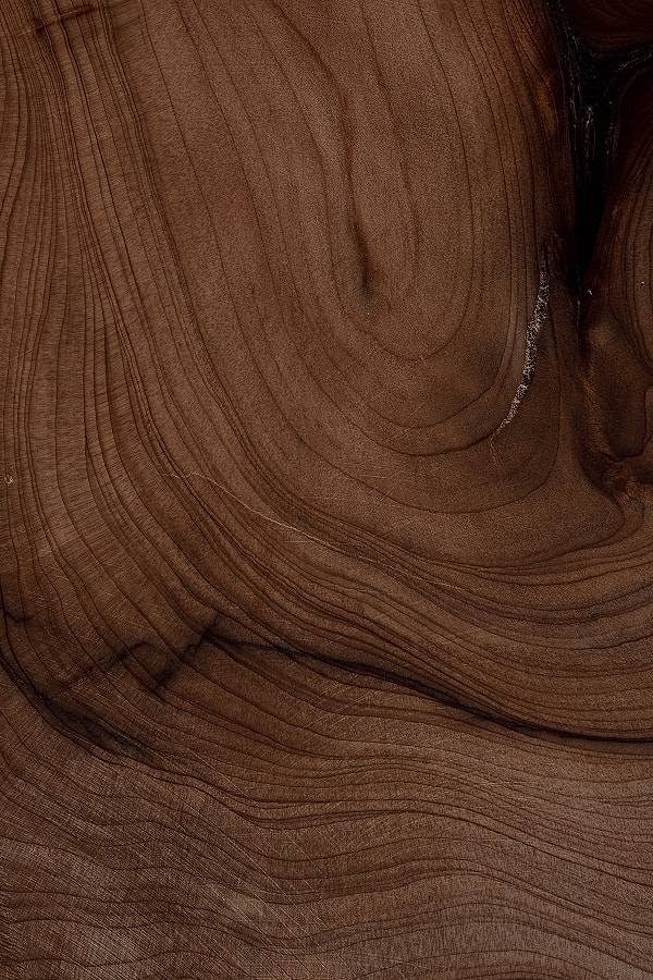 Close-up of smooth, polished wood texture.