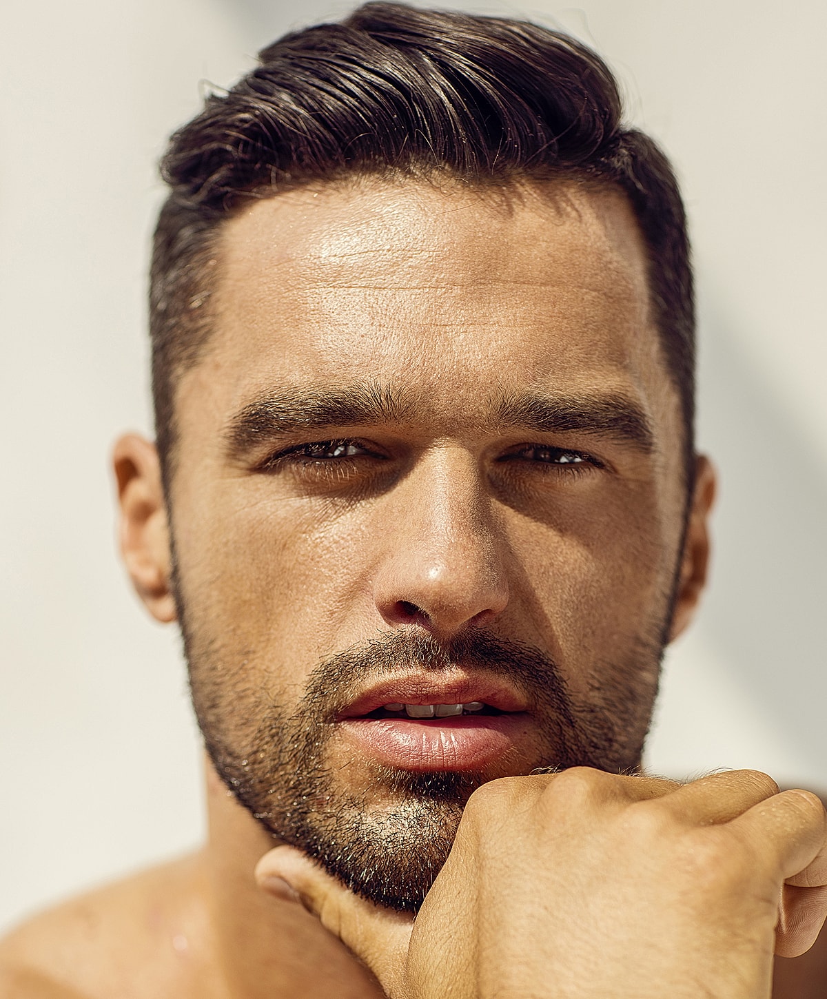 Close-up of a man with stylish hair.